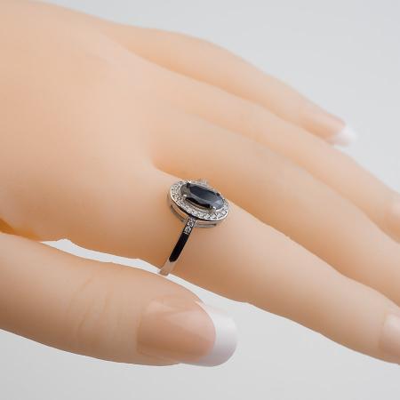 Stříbrný prsten - černý oválný zirkon, čiré kulaté zirkony | Argento.cz