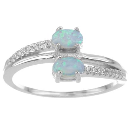 Stříbrný prsten - bílé oválné syntetické opály, čiré kulaté zirkony | Argento.cz