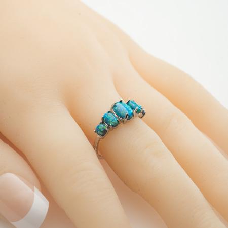 Stříbrný prsten - modré oválné syntetické opály | Argento.cz