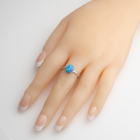 Stříbrný prsten - modrý oválný syntetický opál | Argento.cz