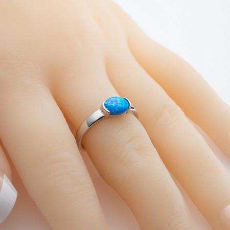 Stříbrný prsten - modrý oválný syntetický opál | Argento.cz